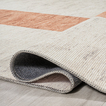 Raita Modern Distressed Stripe Machine-washable Area Rug
